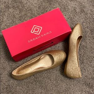 Gold glitter flats.